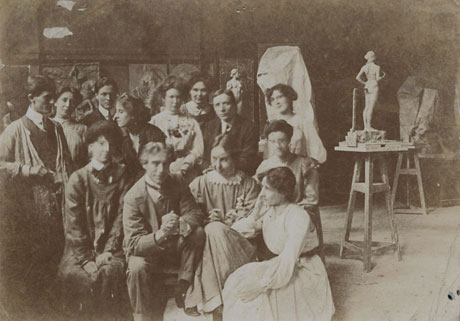 Albert Toft seated in a studio with students, Leeds Museums & Galleries (Henry Moore Institute Archive)
 